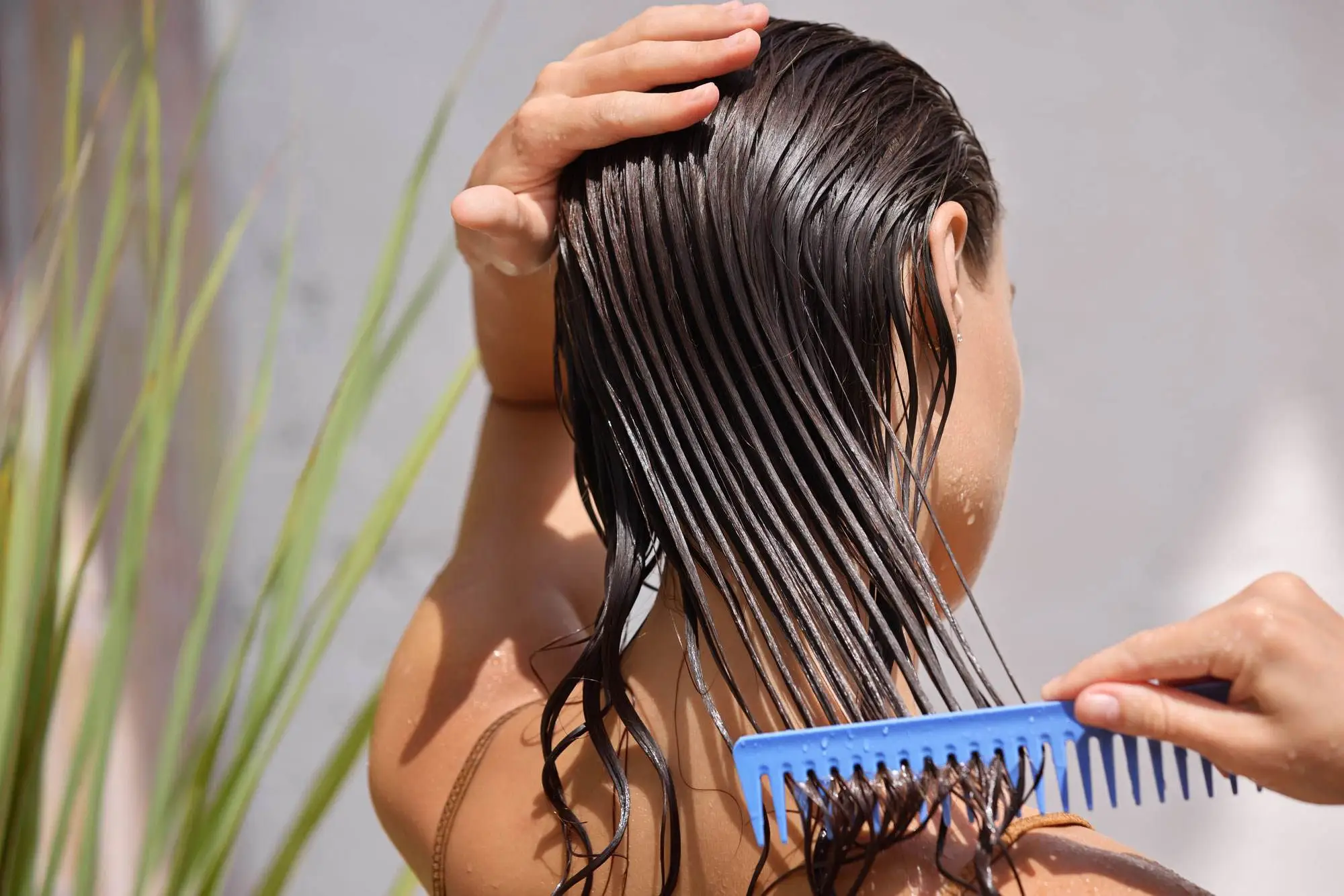 Hair combing with blue comb